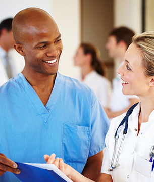 Two people working in a hospital